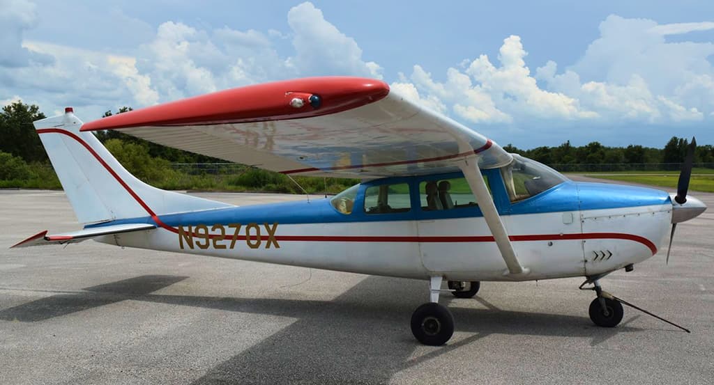 Aircraft before refinishing — original weathered paint at Ace Aircraft Refinishing in Bartow, Florida