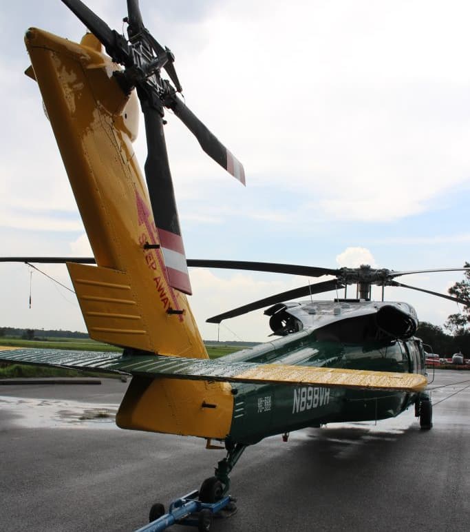 Helicopter with high-gloss Sherwin Williams aerospace finish by Ace Aircraft Refinishing
